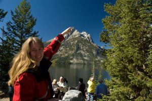 Jodi Points to the Tip of the Teton Range